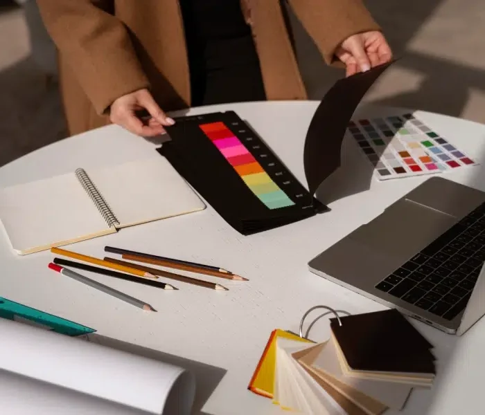 high-angle-woman-working-as-interior-designer